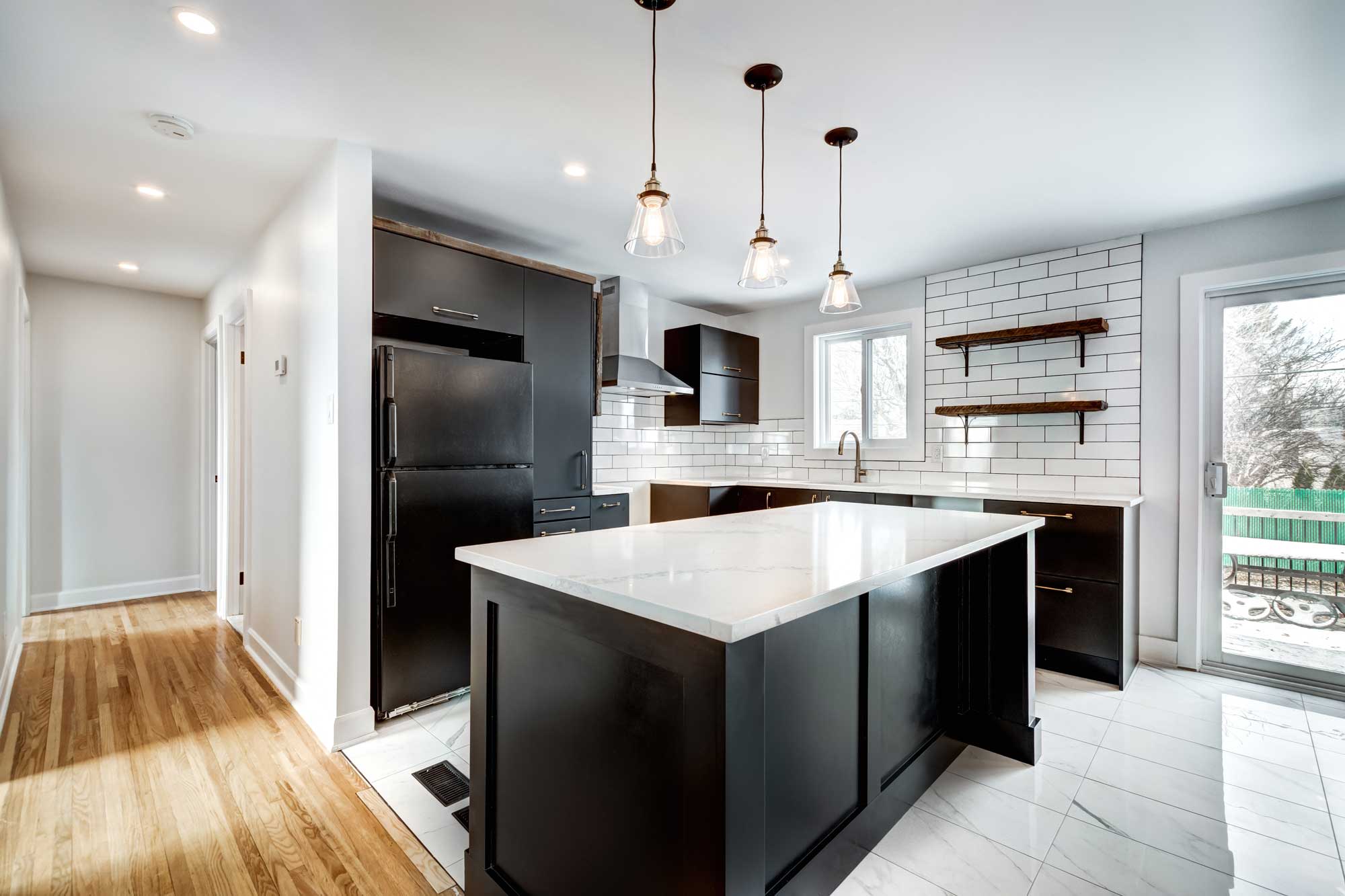 Interior remodeling project with dark kitchen cabinets in Centennial, CO